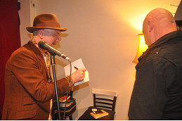 Self-deprecating singer does solo book signing