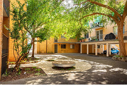 North Melbourne courtyards and car park given green boost under council grants