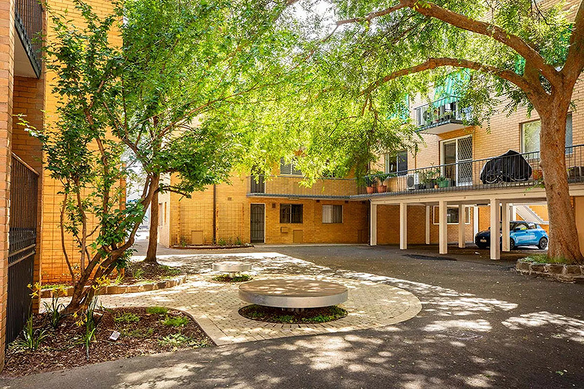 North Melbourne courtyards and car park given green boost under council grants